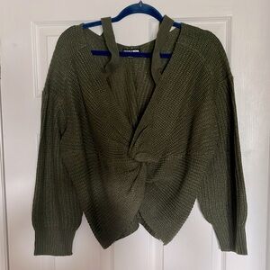 Reversible green knitted sweater
